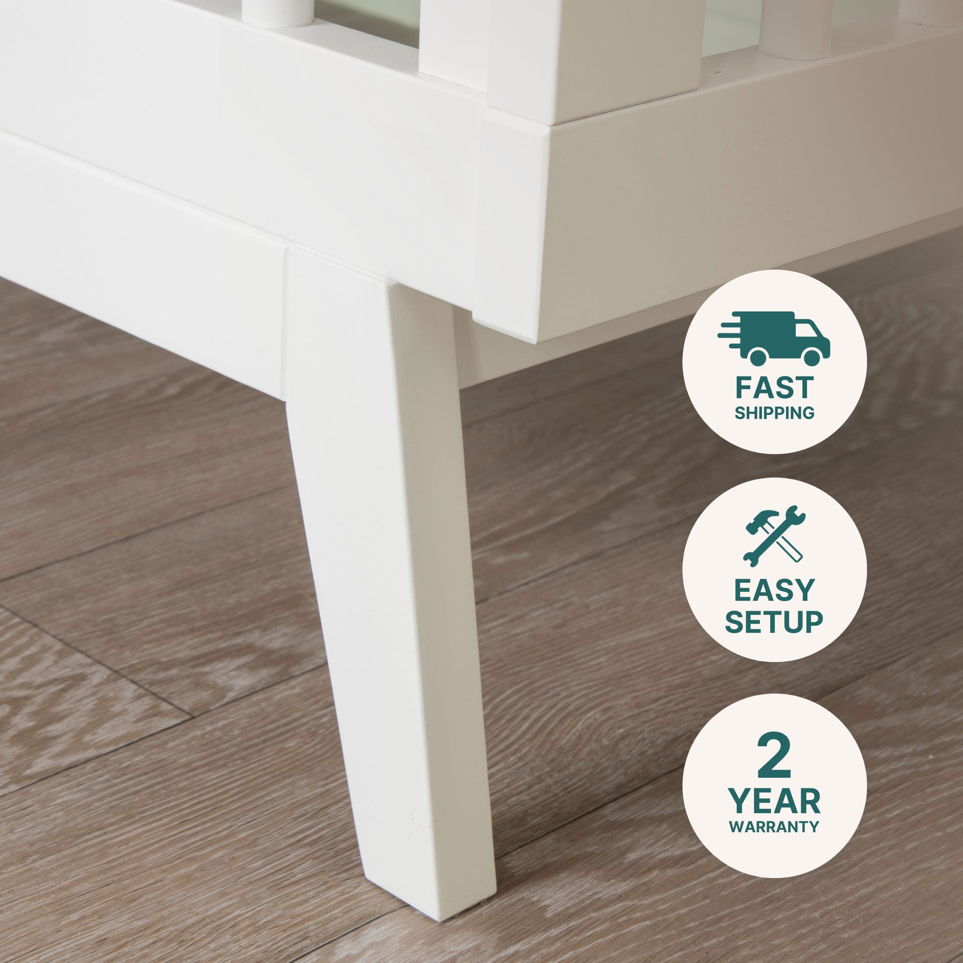 Close-up of a Soho Convertible Crib leg by dadada baby on wood flooring, with icons for Fast Shipping, Easy Setup, and 2 Year Warranty—ideal for your mid-century nursery or as a base for the Newton crib mattress.