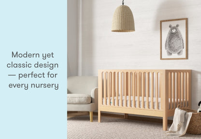 A serene nursery featuring a modern yet classic wooden crib with the text "Modern yet classic design — perfect for every nursery" displayed prominently.