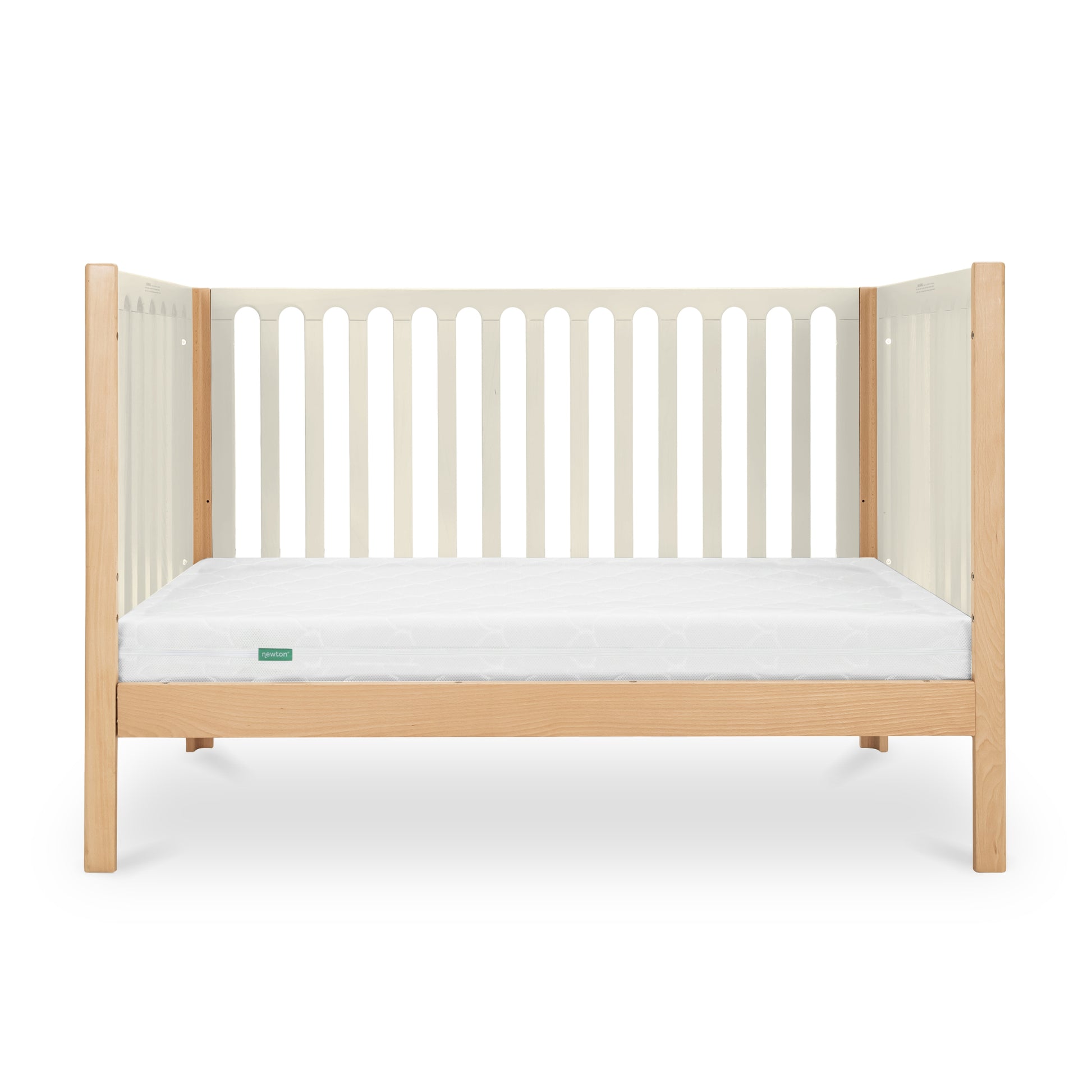 The Newton Galileo Convertible Crib by Newton Baby features beech wood legs and side panels, white vertical slats, and a white mattress, shown on a plain white background. Easily adapts to a toddler bed as your child grows.