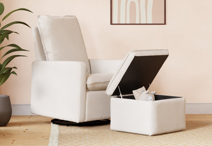A modern nursery featuring a comfortable white glider chair and a matching storage ottoman with its lid open, set against a peach-colored wall.