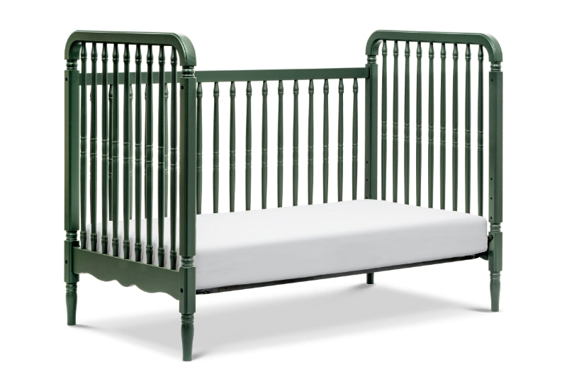 Classic green baby crib with vertical slats and curved end panels, isolated on a white background.