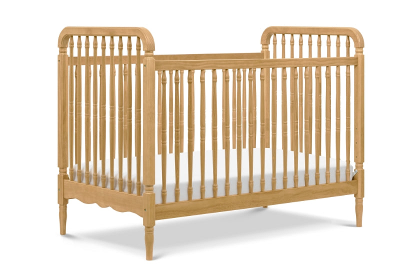 Classic wooden crib with decorative spindles and curved headboards, isolated on a white background. 999-8608-HNY