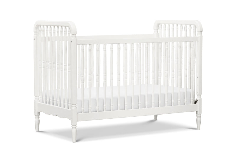A classic white crib with vertical slats and solid end panels, isolated on a white background. 999-8608-WHT