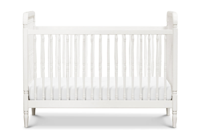 White wooden baby crib with slatted sides on a plain background.
