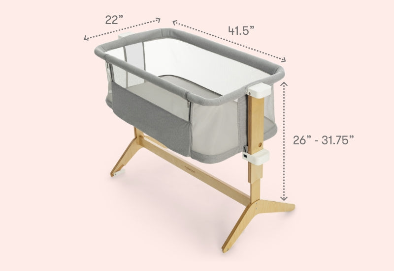 Gray and white bassinet with adjustable wooden legs, dimensions shown as 22" by 41.5" and height adjustable between 26" - 31.75".