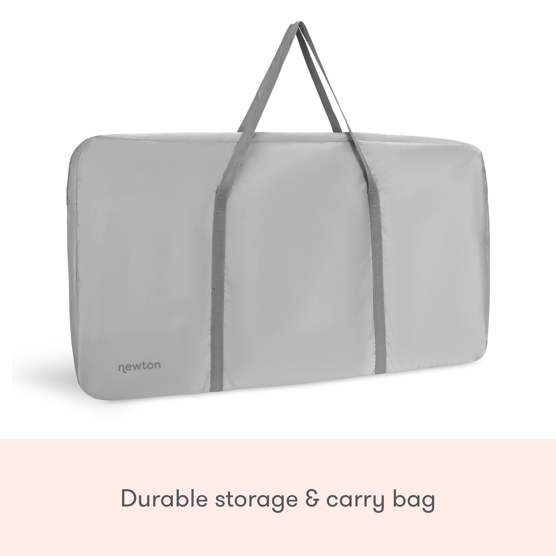 A light gray rectangular Newton Baby storage and carry bag with two handles stands upright, featuring "newton" in the corner. Perfect for storing or carrying your Bassinet & Bedside Sleeper. Durable and convenient design.