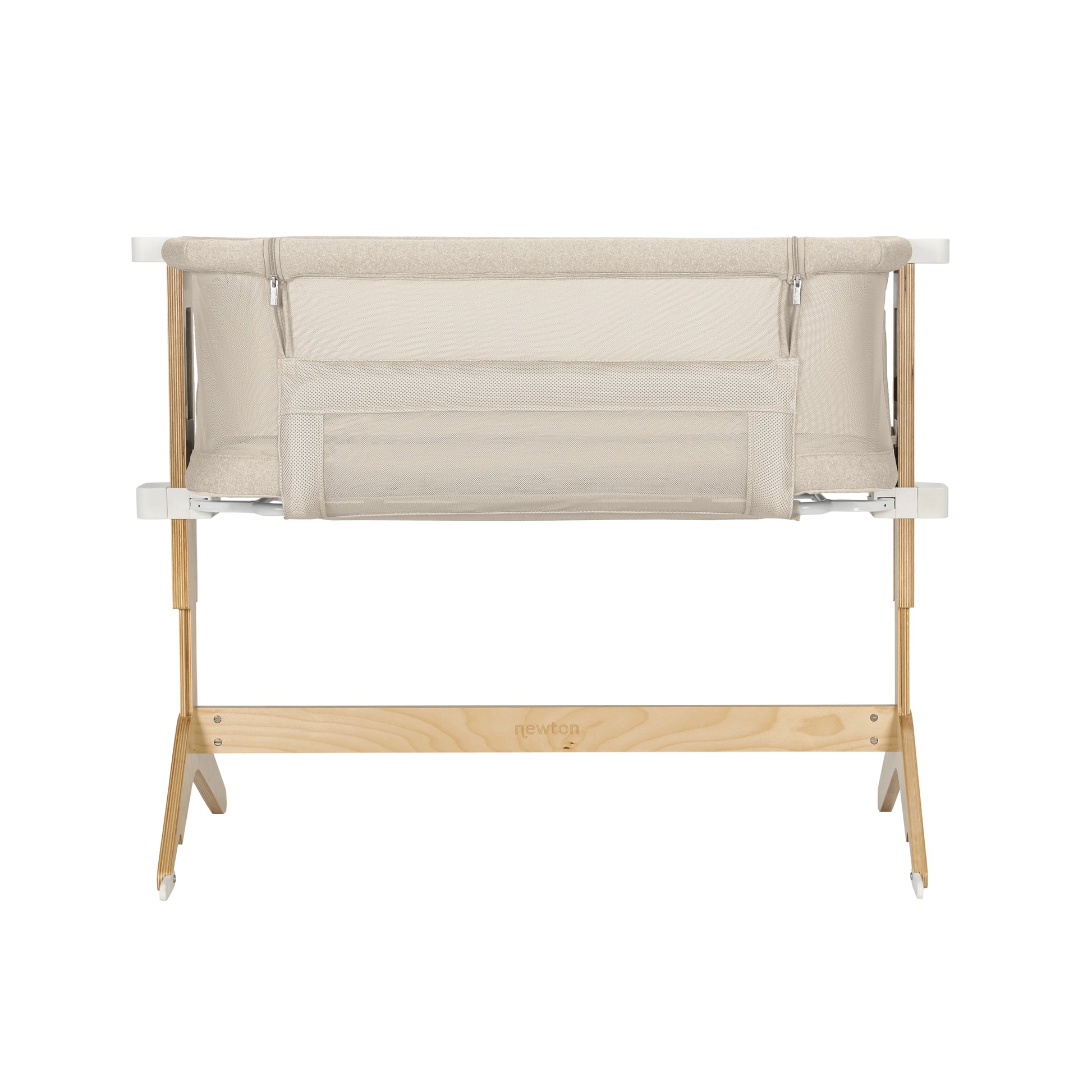 The Newton Baby Bassinet & Bedside Sleeper, shown from the front against a white background, features beige and white mesh sides for breathability, a wooden base, and includes a Wovenaire mattress.
