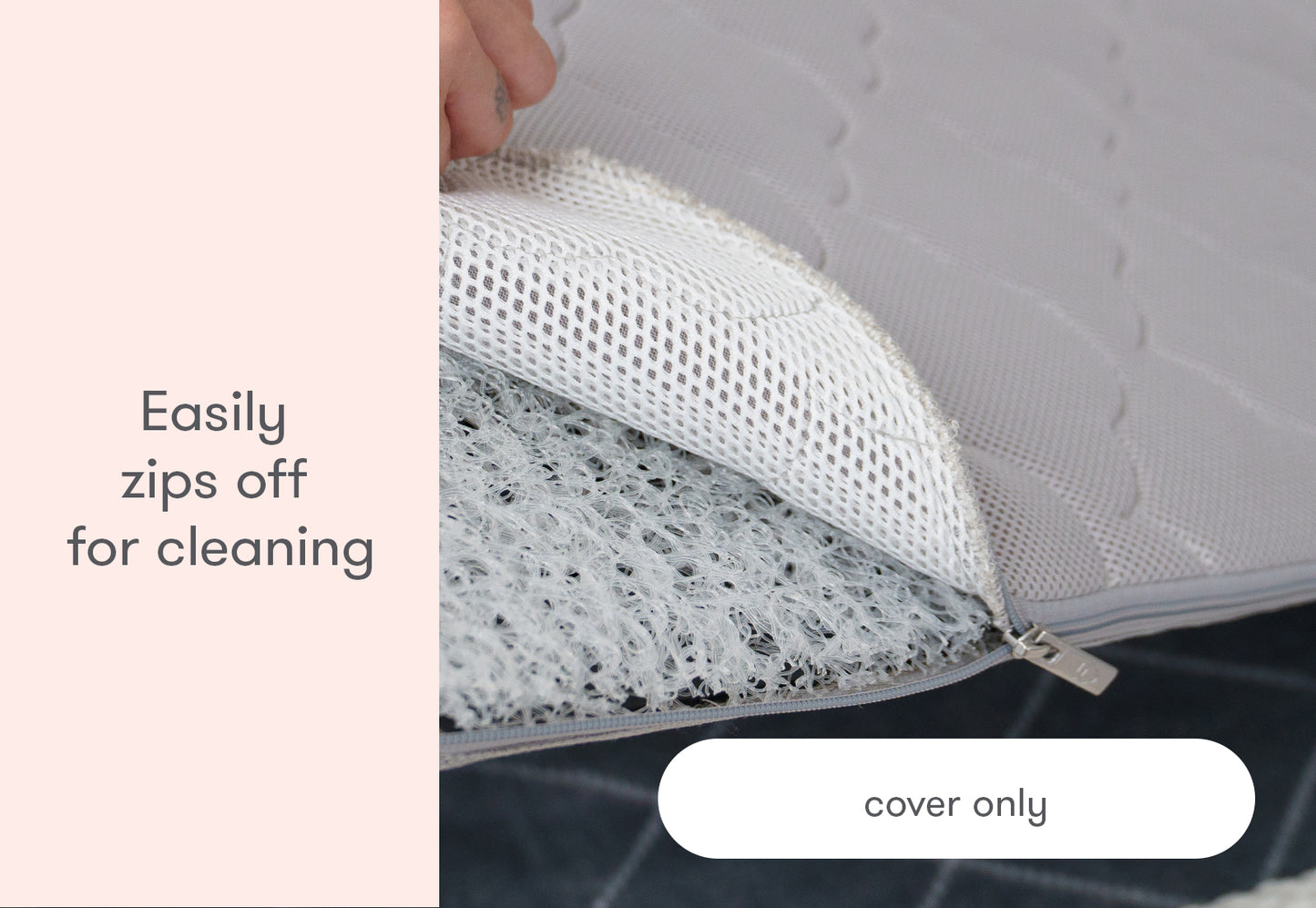 A close-up view of a hand unzipping a bassinet cover for cleaning, with text stating "Easily zips off for cleaning" and "cover only."