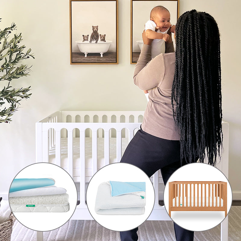 A woman with long braids holds a smiling baby in a nursery with the Newton Baby Galileo Crib and Waterproof Mattress & Pad Set. Circular insets highlight the mattress, pad, bedding, and wooden rail. Framed animal art hangs above.