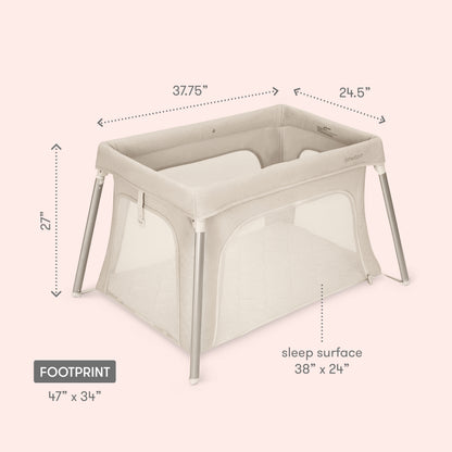 The Newton Baby Compact Travel Crib & Play Yard in beige is shown on a light background. It has mesh sides, a breathable mattress, measures 37.75"x24.5"x27", with a 38"x24" sleep surface and a 47"x34" footprint.