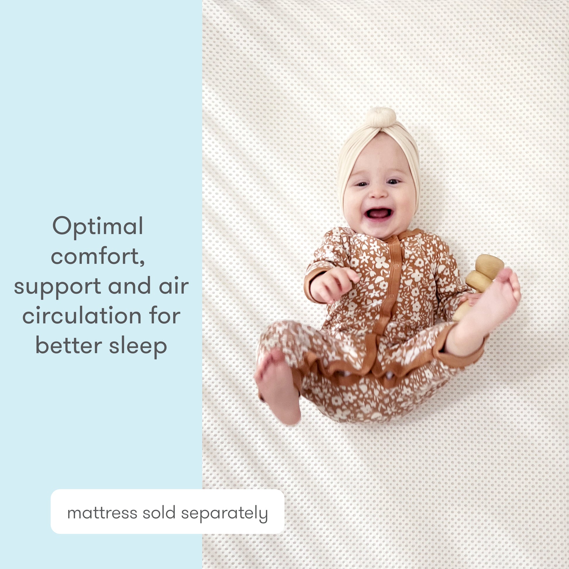 A smiling baby in a beige floral outfit and headwrap lies on a Newton Baby Extra Essential Crib Mattress Cover, alongside text: “Optimal comfort, support and ultra-breathable air circulation for better sleep.” Mattress sold separately.