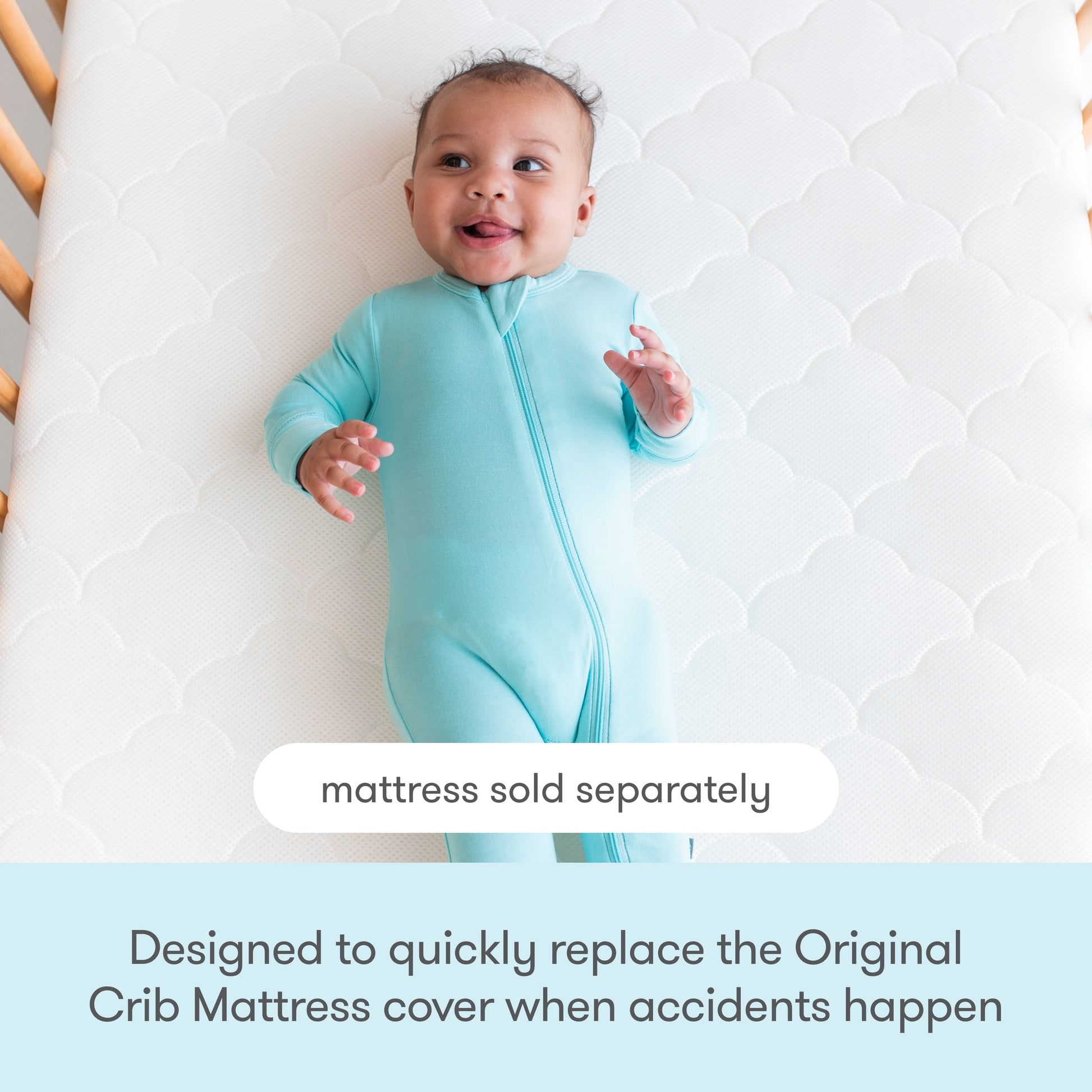 A smiling baby in a light blue onesie lies on a white crib mattress. Text reads: Mattress sold separately. Newton Baby Extra Original Crib Mattress Cover—designed for fast replacement when accidents happen.