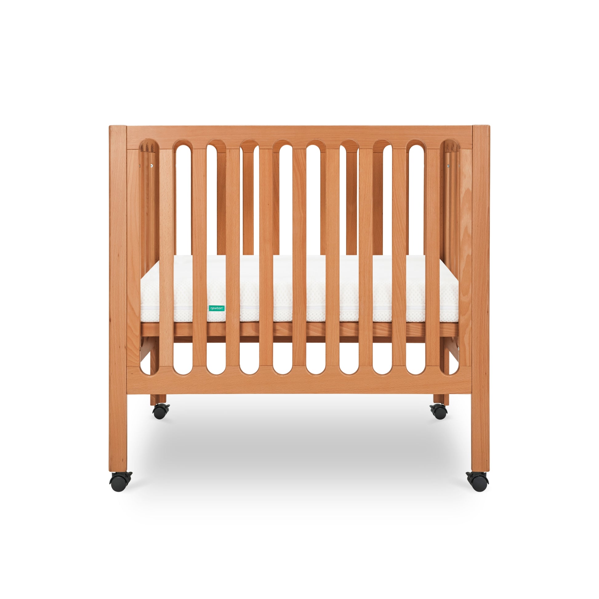 Wooden crib with white mattress on a white background. 999-8430-CST