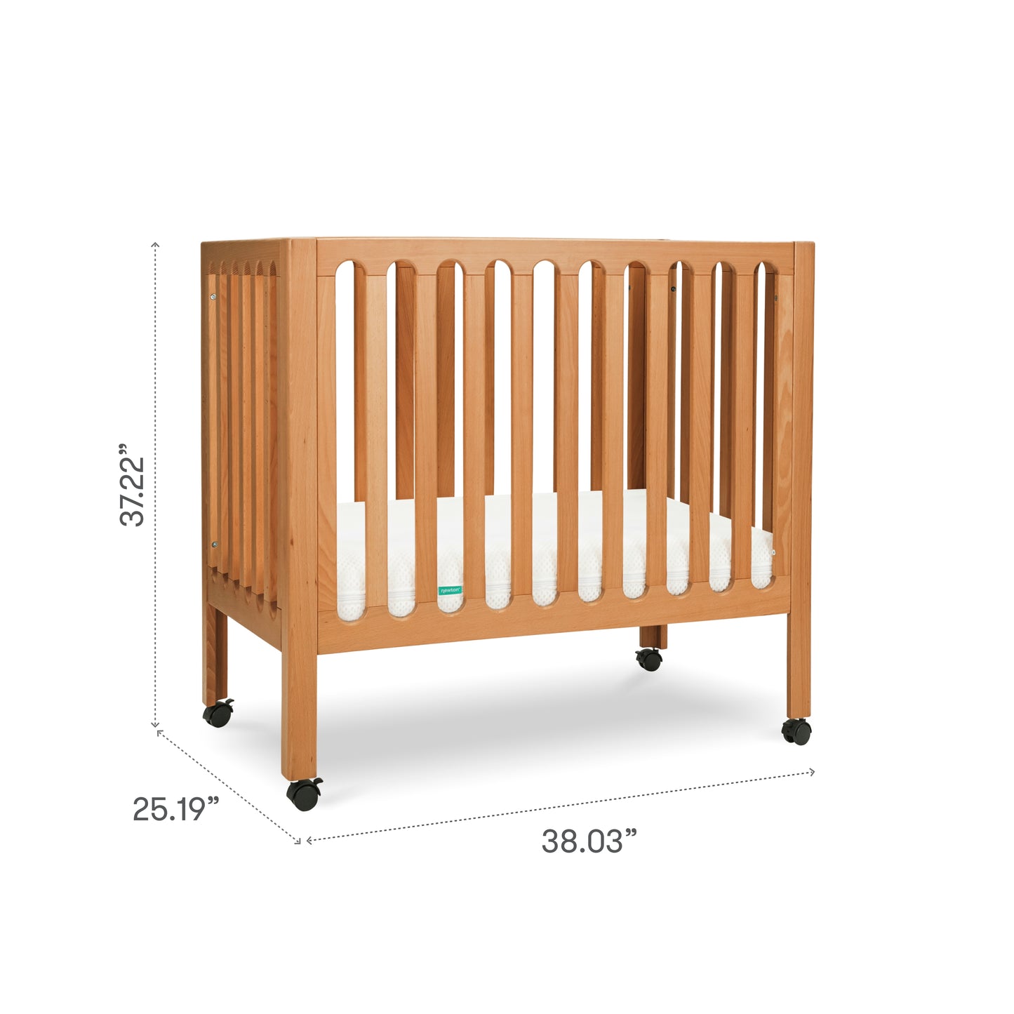 The Newton Baby Galileo Mini Crib with Newton Mattress is a portable beech wood crib with vertical slats, wheels on each leg, and a white mattress. Dimensions: 37.22" H x 25.19" D x 38.03" W.