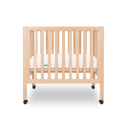 Wooden crib with a white mattress on a white background 999-8430-NAT
