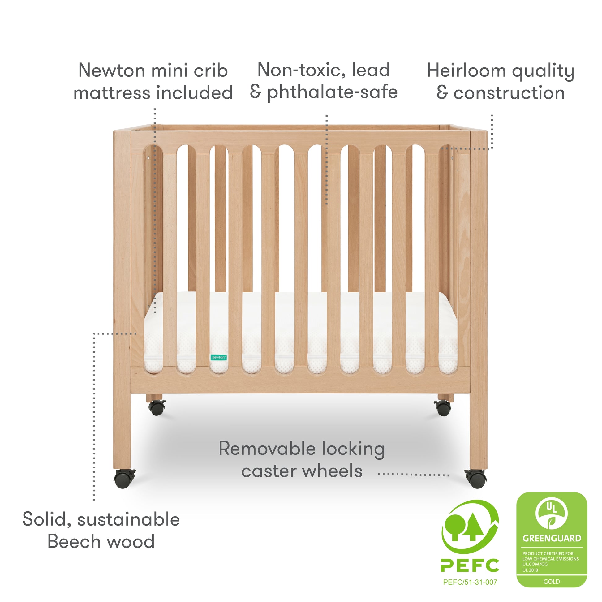 The Newton Galileo Mini Crib with Newton Mattress by Newton Baby features solid beech wood, a white mattress, removable locking casters, non-toxic materials, heirloom quality, PEFC and GREENGUARD Gold certifications, and a portable design.