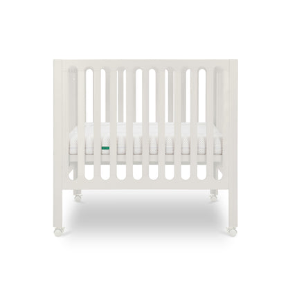 White crib with a visible brand logo on a white background. 999-8430-WRW