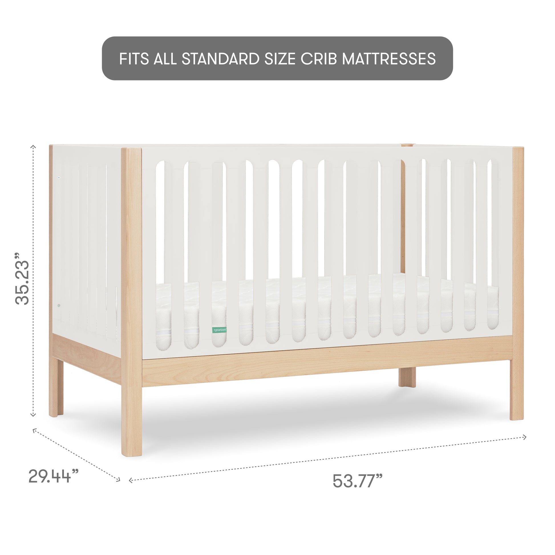 The Newton Galileo Convertible Crib by Newton Baby features slatted sides, a sleek white finish, and measures 35.23”H x 29.44”D x 53.77”W to fit all standard crib mattresses—ideal for modern nurseries.