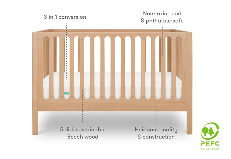 newton galileo crib in natural color, diagram with information that reads, "3-in-1 conversion, non-toxic, lead & phthalate-safe, heirloom quality & construction, solid, sustainable beech wood" PEFC certified badge