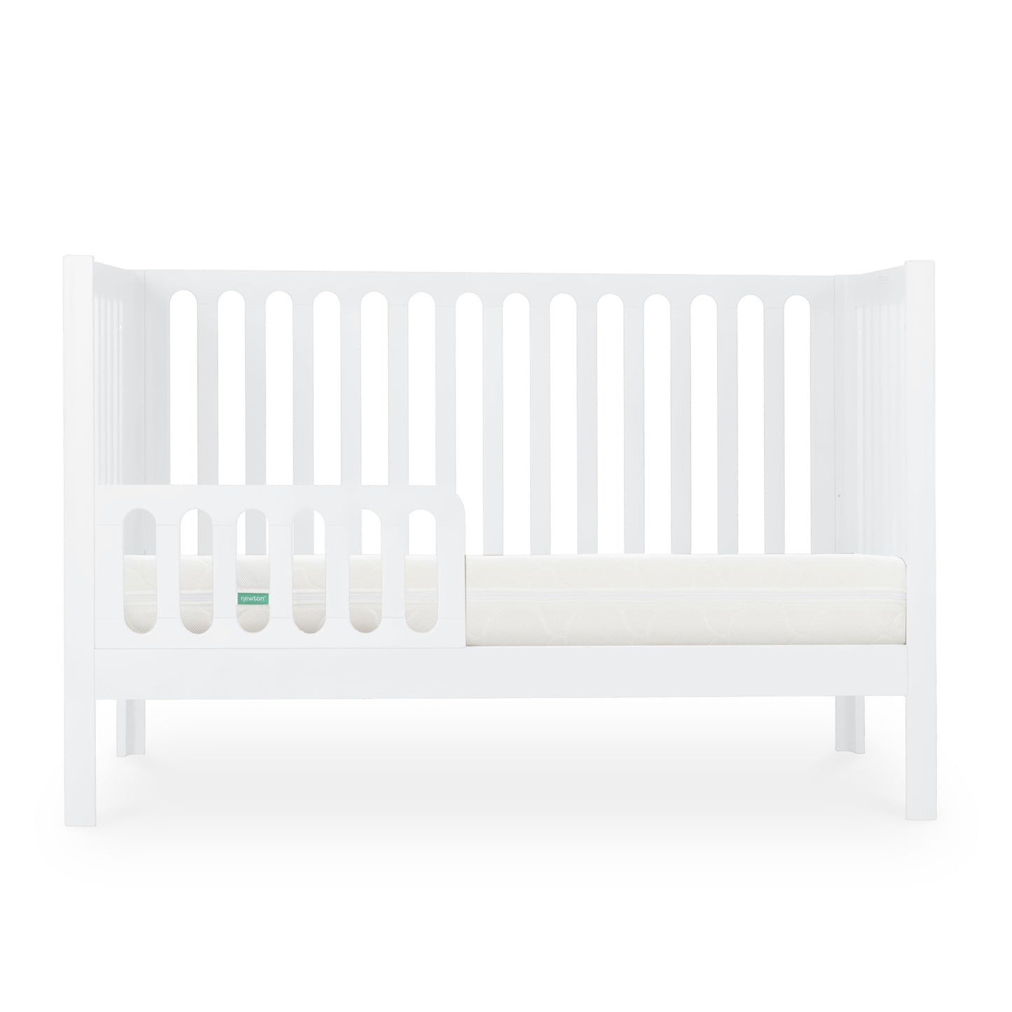 The Newton Galileo Convertible Crib by Newton Baby is a modern white crib with vertical slats, a partial left-side guardrail, and a white mattress. Its minimalist design easily converts to a toddler bed as your child grows.