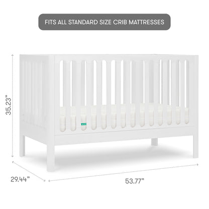 White baby crib with slatted sides and a visible mattress, isolated on a gray background with measurements, 35.23 inches tall, 29.44 inches wide, 53.77 inches long, with text "fits all standard size crib mattresses"