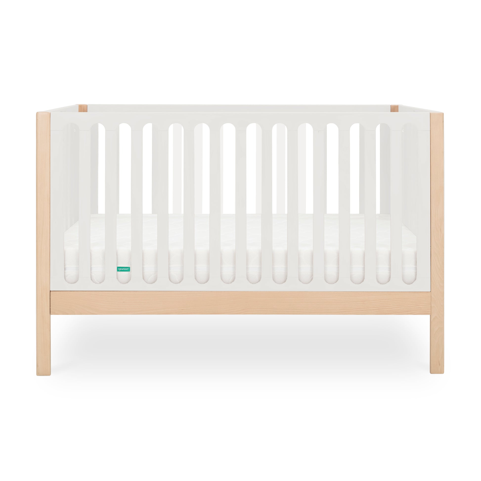 The Newton Baby Newton Galileo Convertible Crib features natural beech wood legs, a white frame with slatted sides, and a white mattress. This modern crib converts to a toddler bed for lasting versatility and is pictured against a plain white background.