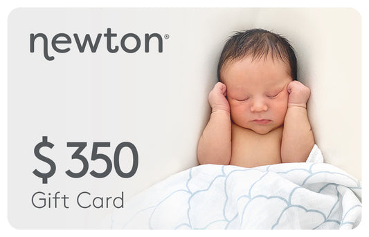 A peaceful sleeping newborn with hands raised to its ears under a white and blue blanket, next to a Newton logo and a $350 gift card promotional text. GIFT350