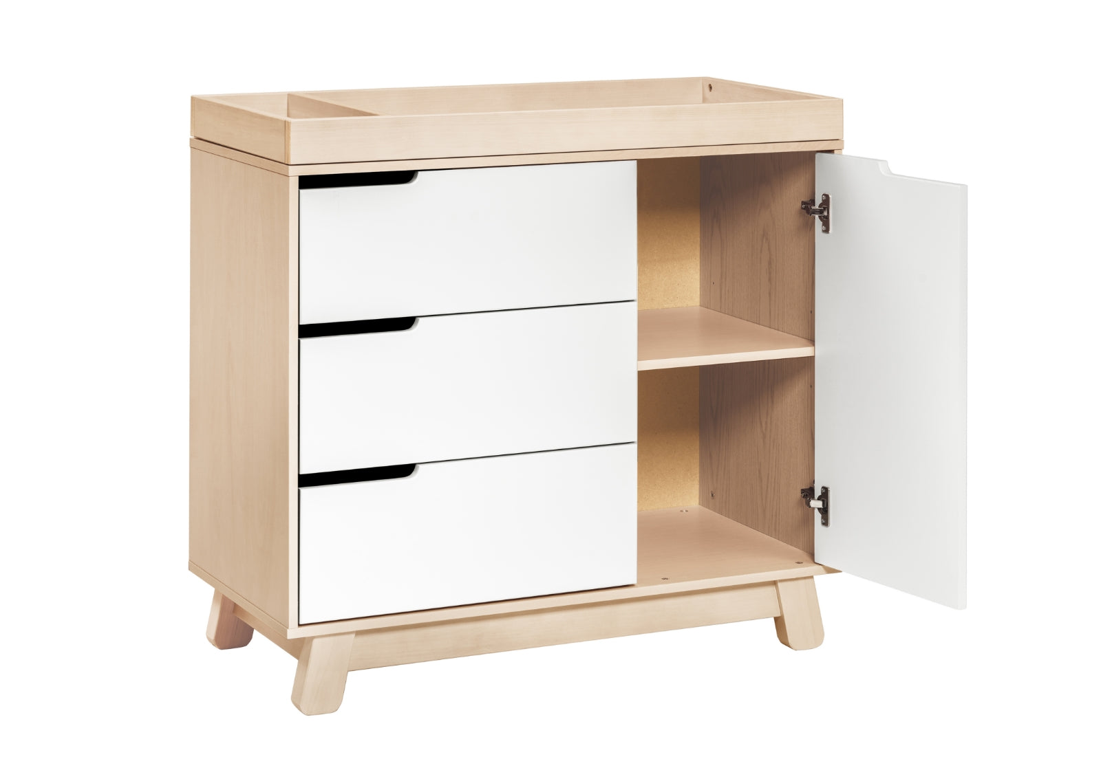 A modern baby changing table with three white drawers and a side cabinet open to reveal shelving, set against an isolated background.
