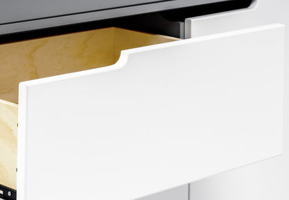 Close-up of a white drawer partially opened, showing its sleek design and the wooden interior of the cabinet.