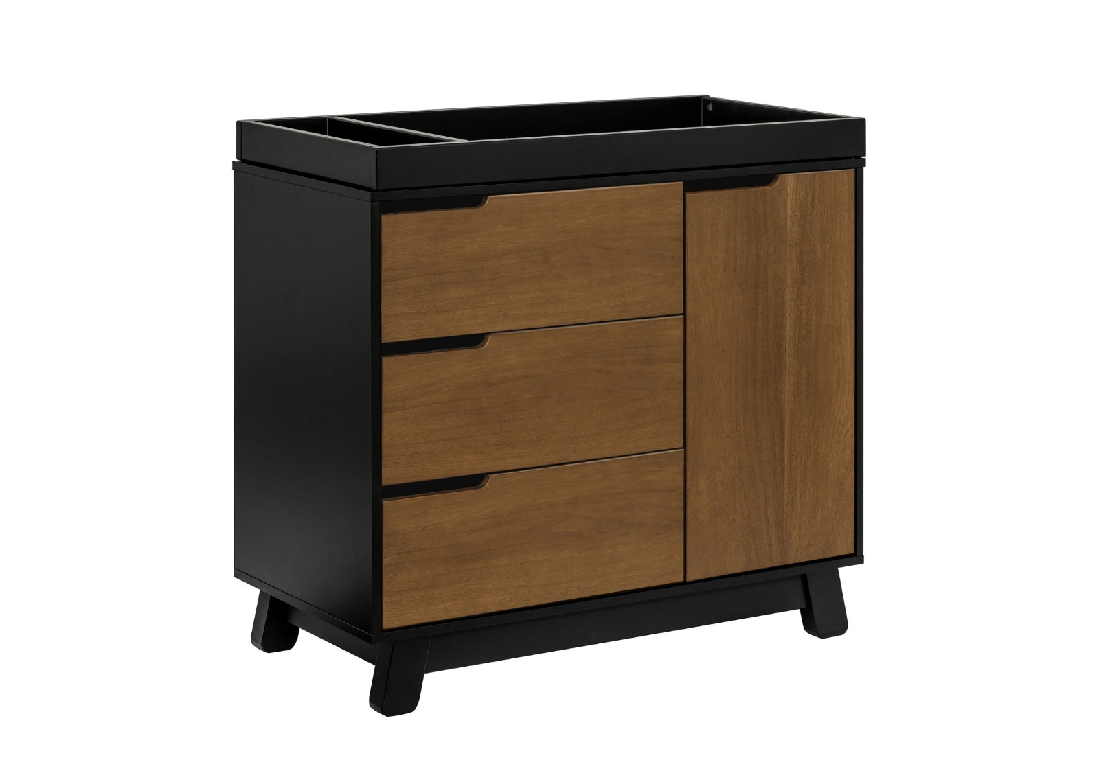 ALT text: "Modern changing table dresser with a combination of black and natural wood finishes, featuring three drawers and an open shelf on the top right side."