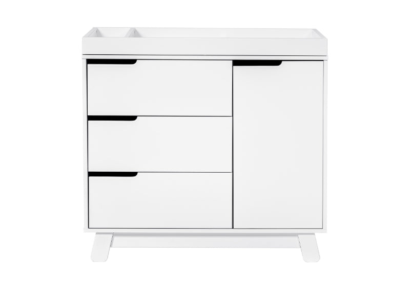 White modern nursery dresser with a changing table top, featuring three drawers and a side cabinet.