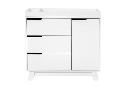 White modern nursery dresser with a changing table top, featuring three drawers and a side cabinet.