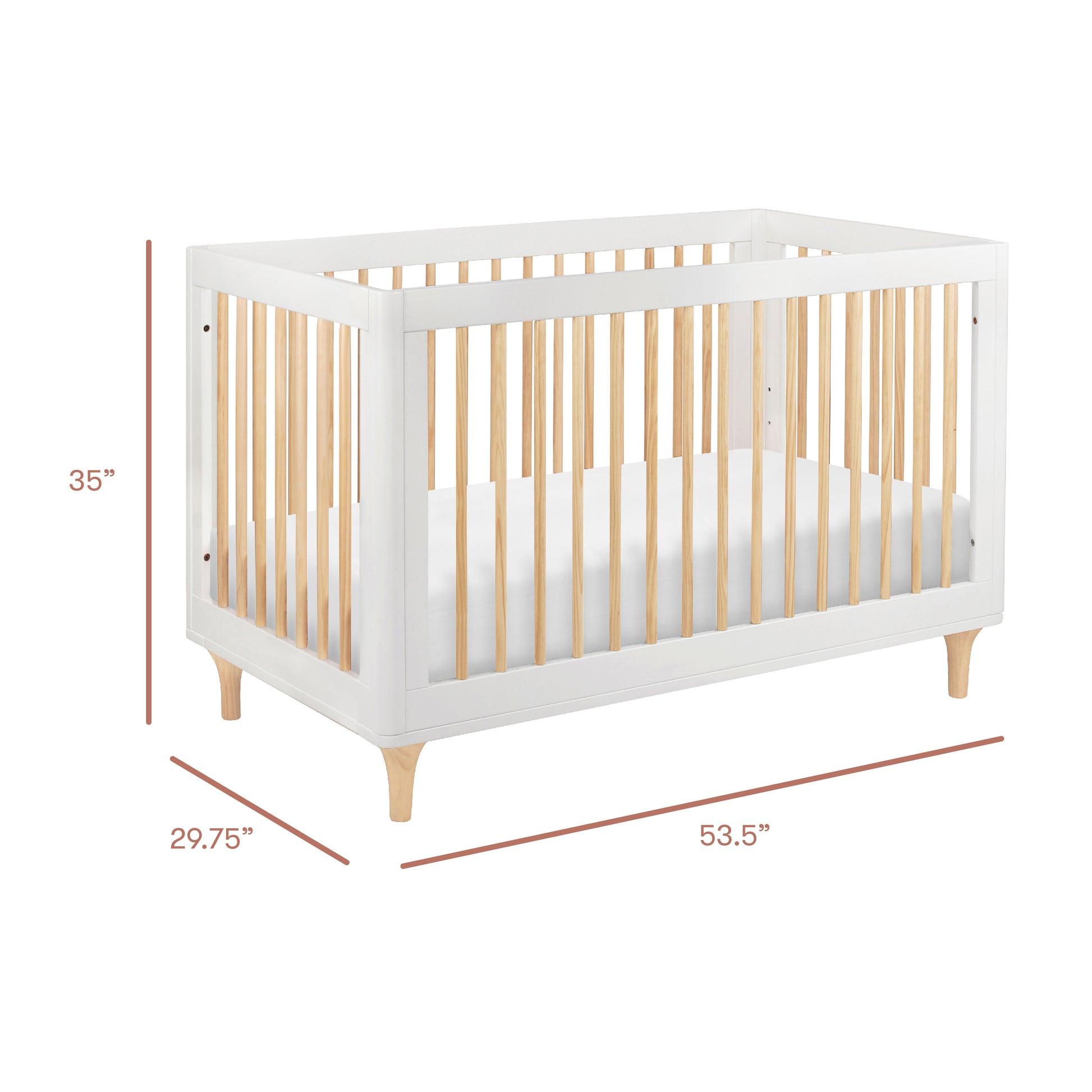 The Babyletto Lolly Convertible Crib features a modern design with a white frame, natural wood slats, and legs made from sturdy New Zealand pine. This crib measures 35 inches high, 29.75 inches deep, and 53.5 inches wide.