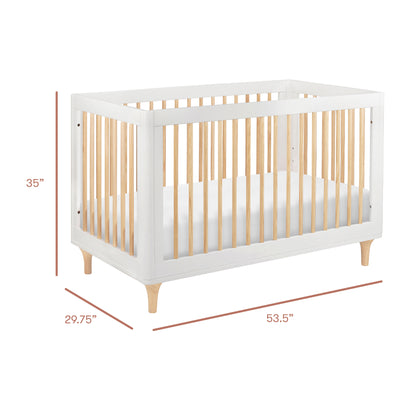 The Babyletto Lolly Convertible Crib features a modern design with a white frame, natural wood slats, and legs made from sturdy New Zealand pine. This crib measures 35 inches high, 29.75 inches deep, and 53.5 inches wide.
