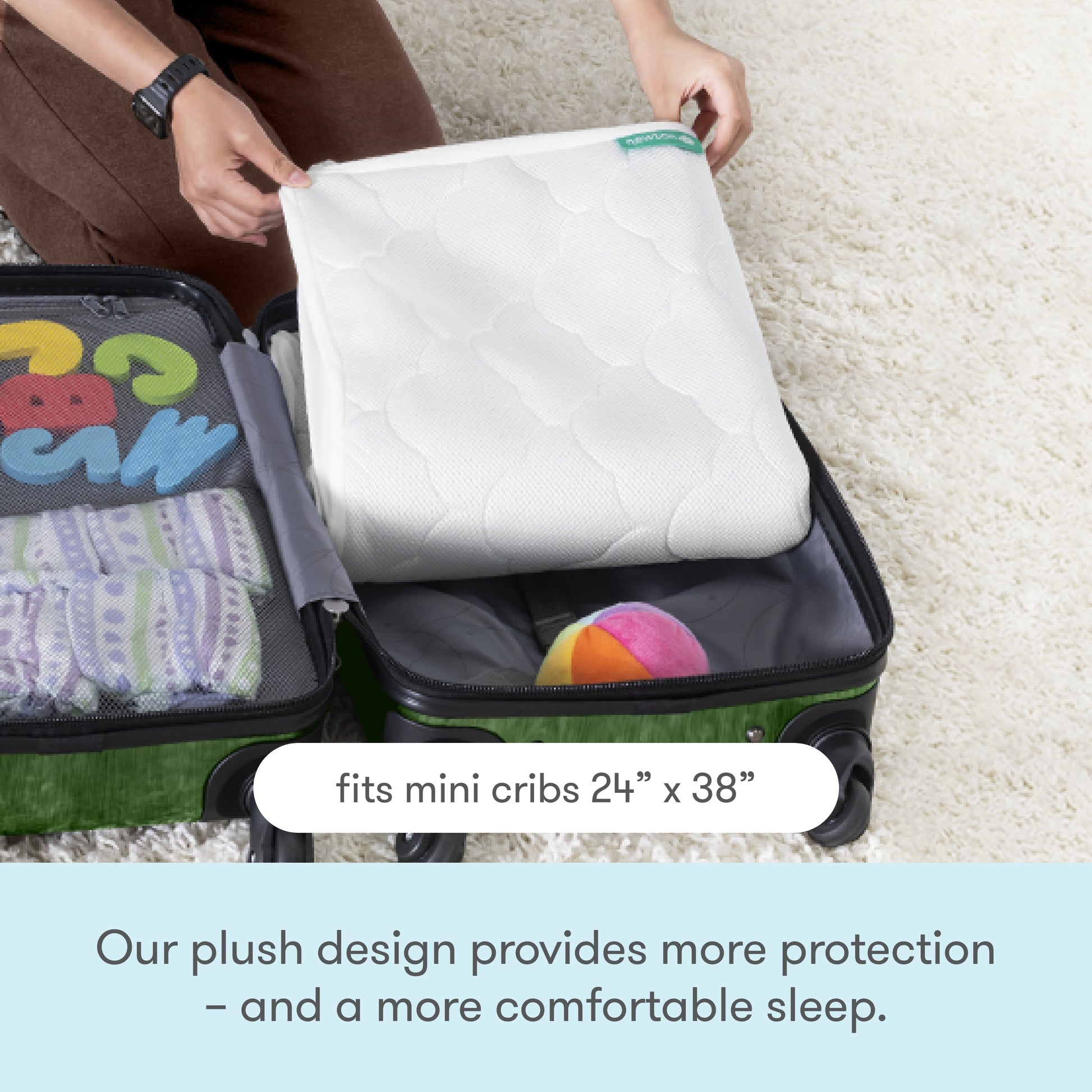Woman packing the waterproof mini crib mattress pad in a suitcase with text, "fits mini cribs 24" x 38", our plush design provides more protection - and a more comfortable sleep.