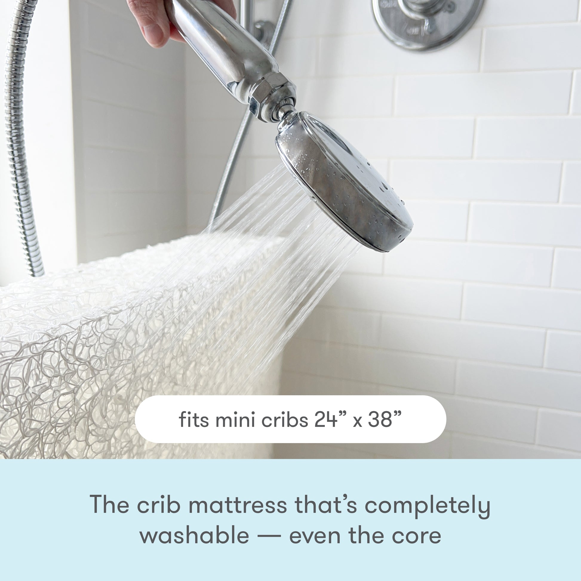 Image of a crib mattress being washed under a showerhead with text that reads, "The crib mattress that's 100% washable — even the core." 