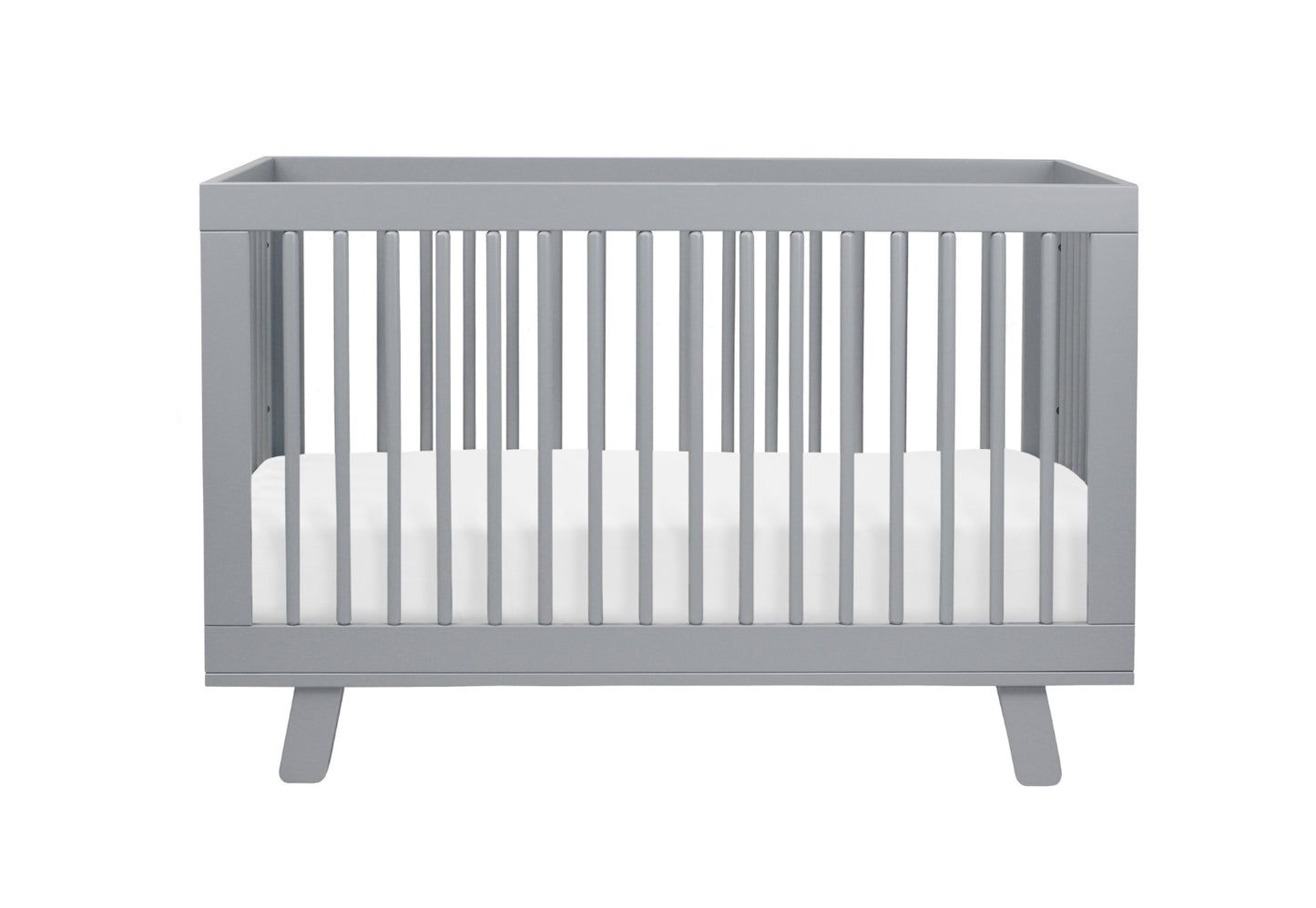 Gray modern baby crib with white mattress isolated on a white background.