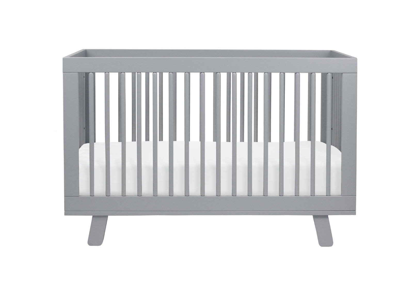 Gray modern baby crib with white mattress isolated on a white background.