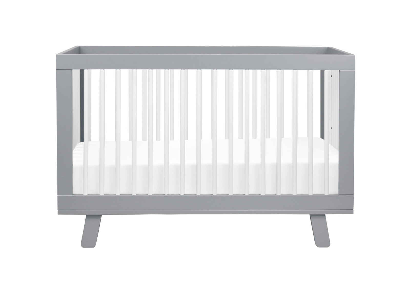 Gray modern crib with a white mattress on a neutral background.