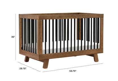 Stylish wooden baby crib with dimensional labels showing length of 53.75 inches, width of 29.75 inches, and height of 35 inches.