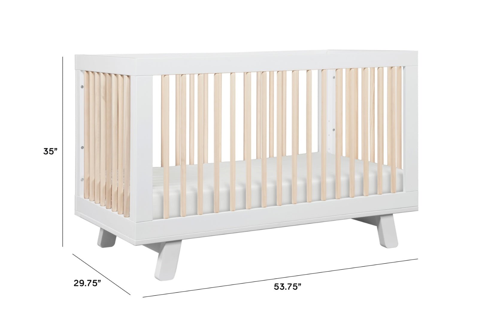 White baby crib with dimensions 29.75" width, 53.75" length, and 35" height, featuring wooden slats and a minimalist design.