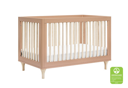 Modern baby crib with slatted sides and tapered legs in a light wood finish, featuring a white mattress and certified by UL GREENGUARD Gold for low chemical emissions.