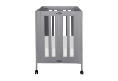 Gray minimalist baby crib with wheels for easy mobility.