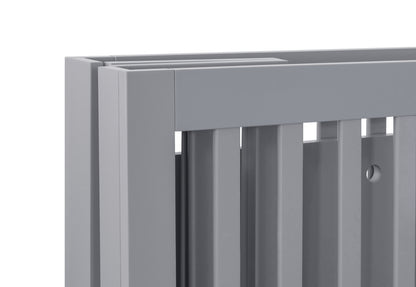 Close-up view of a grey baby crib showcasing its build and finish, no visible text.