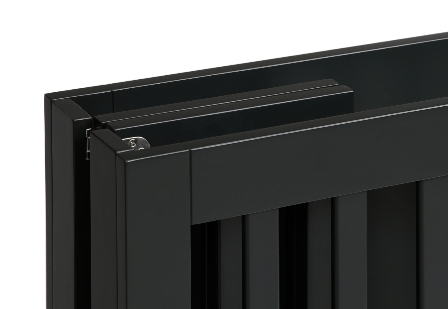 Close-up of a black crib showing detail of corner construction and finish.