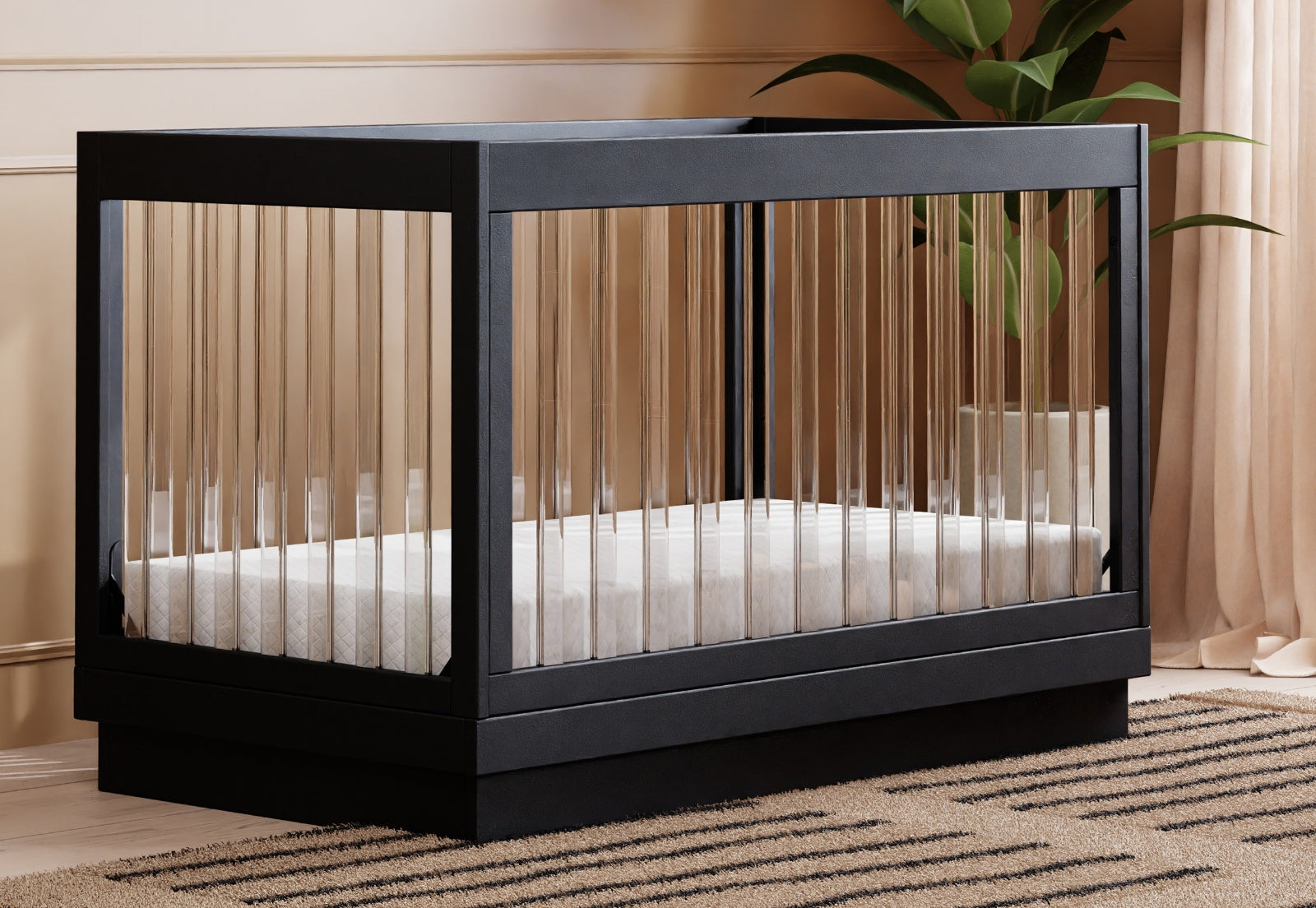 ALT text: Modern black crib with white bedding set against a neutral room decor with a subtle striped rug and a plant in the background.