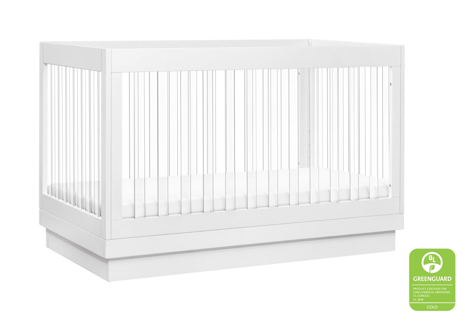 Modern white baby crib featuring a minimalist design and certified as Greenguard Gold for low chemical emissions.