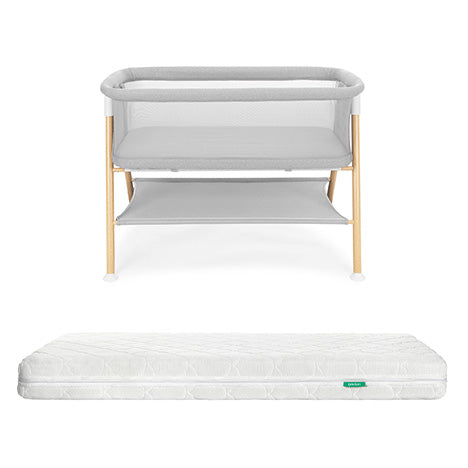 Newton essential bassinet and white newton original mattress on white background 1000-gry-8402
