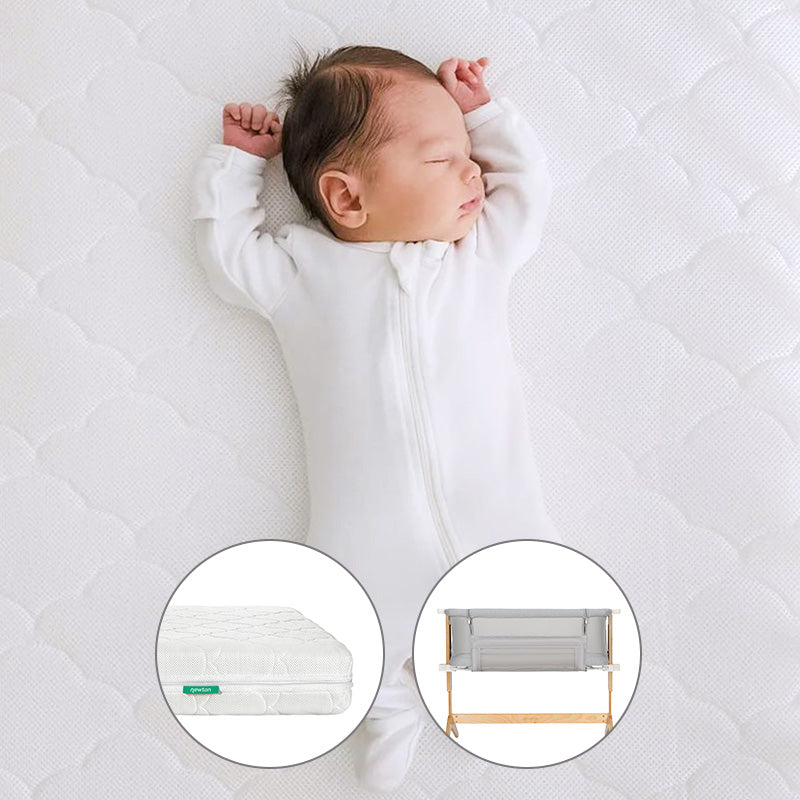 A baby in a white sleepsuit naps on the Newton Baby Bundle 3 BFCM: a quilted, washable crib mattress. Two circular insets below show close-ups of the mattress and a breathable bassinet with wooden legs.