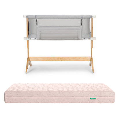 The Newton Baby Bundle 3 BFCM features a breathable bassinet with mesh sides and grey fabric, paired with a light pink quilted washable crib mattress, both shown on a white background.